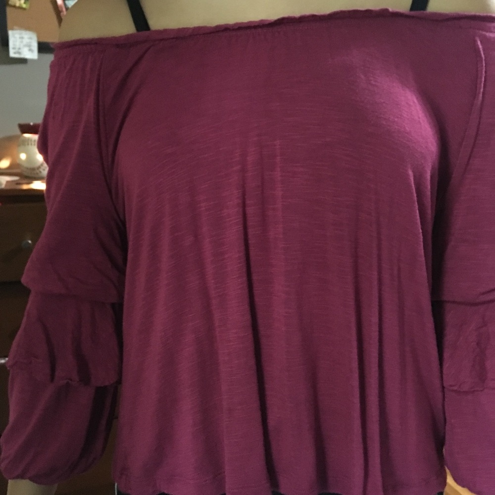 Off the shoulder shirt.
